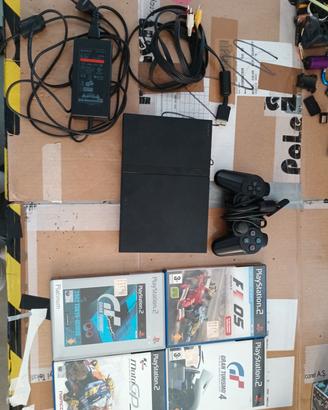 PS2 con vari giochi 