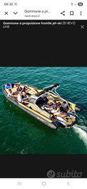 Barca o gommone con moto d'acqua