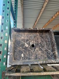Lavabo ad appoggio in pietra naturale