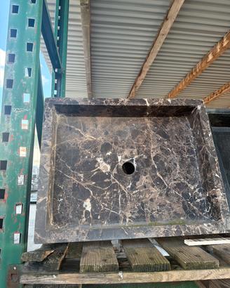 Lavabo ad appoggio in pietra naturale