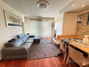 ZONA FIRMIAN: LUMINOSO QUADRILOCALE CON GIARDINO