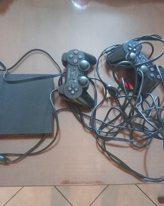 play station 2 con 2 joystick e 3 videogiochi