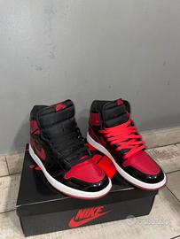 Jordan 1 rosse e nere lucide