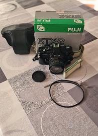 macchina fotografica e accessori vari