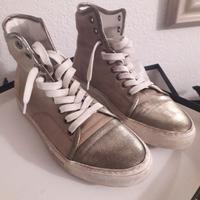 Sneakers artigianali in pelle
