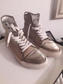 Sneakers artigianali in pelle