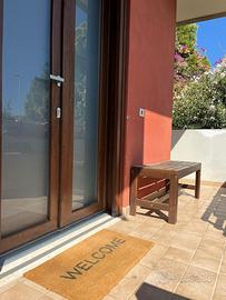 Bivano con balcone e giardino