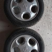 4 cerchi nissan R13 con 4 pleomatici nuovi 