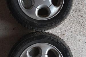 4 cerchi nissan R13 con 4 pleomatici nuovi 