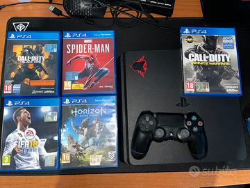 ps4 slim 850gb,un joystick e 5 giochi. trattabile.