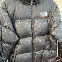 Piumino north face Gucci