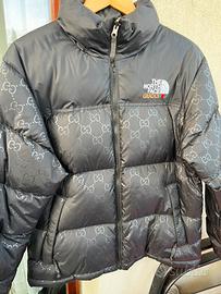 Piumino north face Gucci