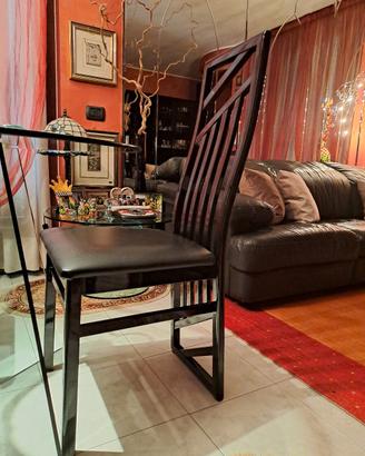 6 sedie nere dal design elegante e moderno