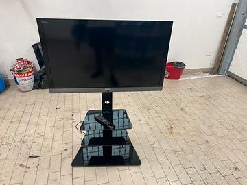 Televisore più supporto con mensole