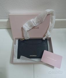 Coccinelle pochette bustina in pelle con tracolla 