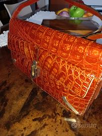 Pochette coccodrillo 