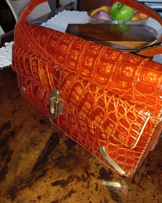 Pochette coccodrillo 