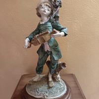 suonatore con scimmia 
