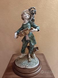 suonatore con scimmia 