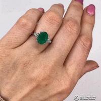 ANELLO ORO 18kt. DIAMANTI E SMERALDO OVALE