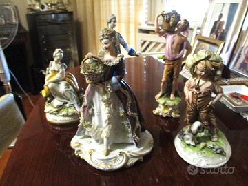 4 BELLE STATUINE DI PORCELLANA.