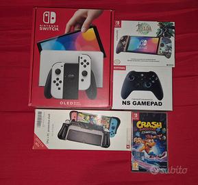 nintendo switch oled più accessori e gioco