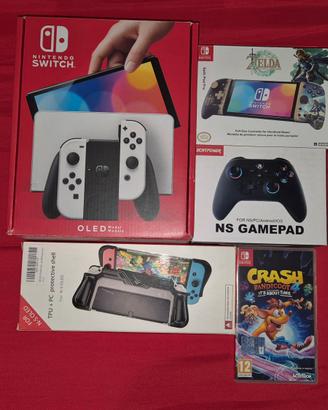 nintendo switch oled più accessori e gioco