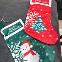 Calze natalizie con pupazzo di neve e albero