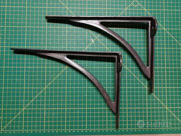 Staffe ad L in ferro battuto