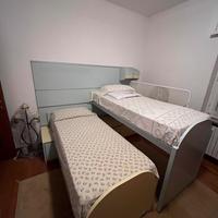 Cameretta per bambini con letto a castello