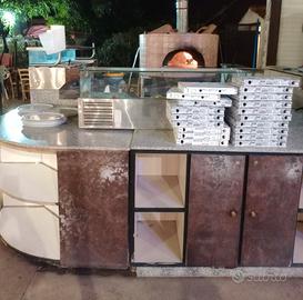 Arredamento pizzeria e forno a legna professionale