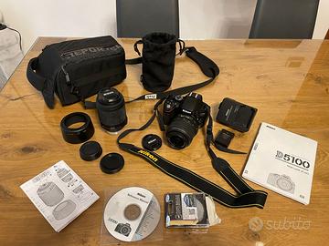 Nikon D5100 + 18-55mm +  55-200mm + Borsa + UV