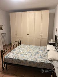 Camera matrimoniale in stile