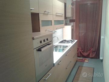 Cucina lineare in finitura rovere naturale