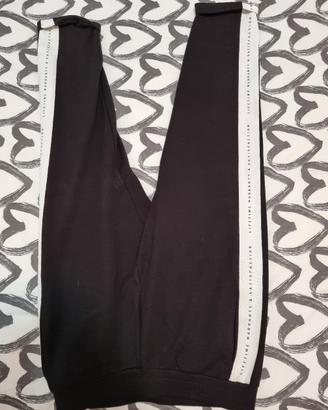 Pantaloni tuta neri con striscia bianca a fianco