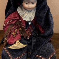 BAMBOLA DI PORCELLANA