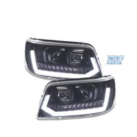 FARI VOLKSWAGEN VW T5 03-09 NUOVO LOOK CON FRECCIA