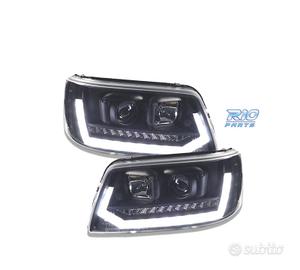FARI VOLKSWAGEN VW T5 03-09 NUOVO LOOK CON FRECCIA