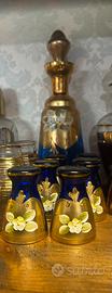 Servizio in vetro blu ed oro