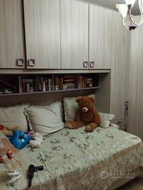 cameretta con cabina armadio profonda angolare,