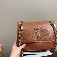 Borsa a catena YSL Niki grande in metallo dorato