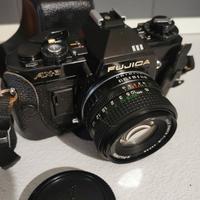 2 macchine fotografiche e teleobiettivo