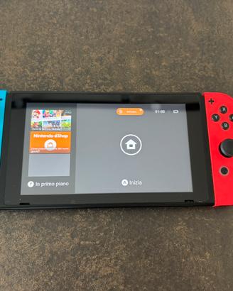 Nintendo Switch+4 giochi+custodia e accessori