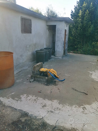Terreno con manufatto condonato