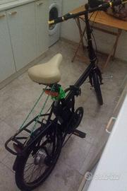 Bici elettrica ha monopattino