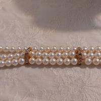Bracciale perle 3 fili dorato anni '80