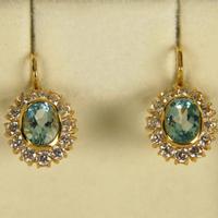 Orecchini a monachella in oro e topazzi