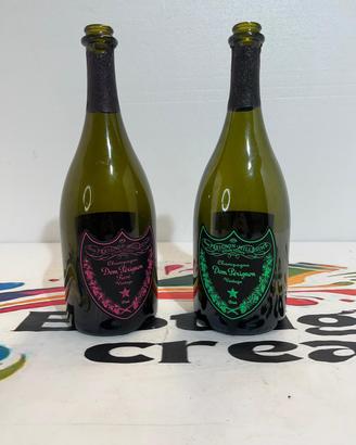 Bottiglie vuote luminose domperignon verde e rosa