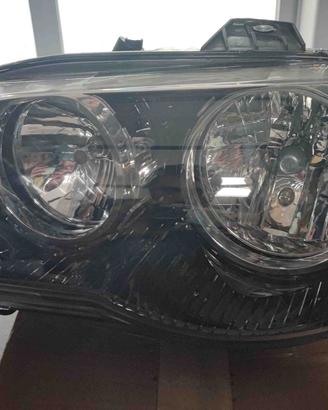 FARO SX FIAT STRADA 2005 VERSIONE ADVENTURE OE 517