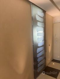 Porta scorrevole in vetro